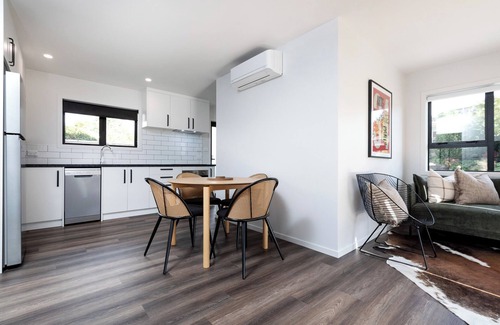 New Plymouth House | Kick back and relax in this calm, stylish space.