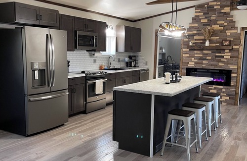 Edray House | Kick back and relax in this calm, stylish space located on 30 acres!
