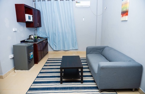 Margibi County Apartment | King Studio Suite with kitchen and Sofa.