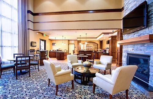 West Valley City Condo | King Suite. Free Breakfast Buffet. Pool, Hot Tub & Waterslide. Near Salt Palace Convention Center!