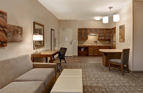 Overland Park Condo | King Suite. Free Breakfast. Pool. Shared BBQ. Gym