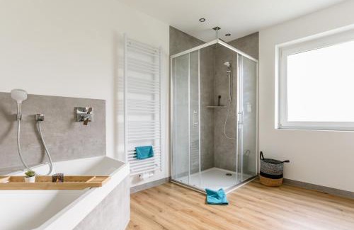 Niedershausen Apartment | Kleeoase - Luxus Apartment- Jacuzzi - Dachterrasse - Kochinsel - See in 10 min