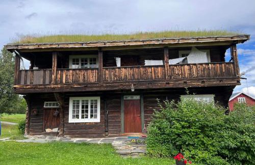 Nord-Fron House | Koselig tømmerhus på gammel gård i Skåbu