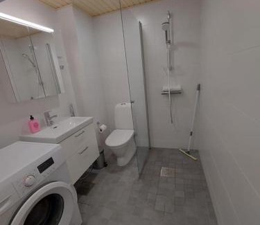 Lantinen District Apartment | Kotimaailma - Tyylikäs kaksio modernilla keittiöllä
