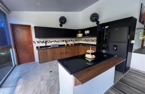 Chinauta House | Kulcana - Cerros del Guacaná