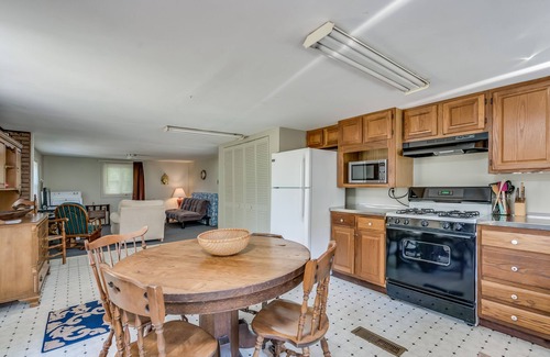 Alexandria Bay Apartment | kyacks and canoes can tie up in Backyard if you come in from the River