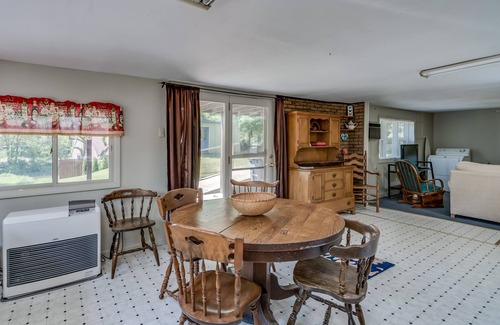 Alexandria Bay Apartment | kyacks and canoes can tie up in Backyard if you come in from the River