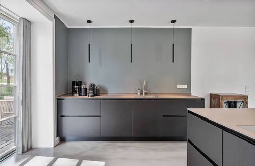 Tating House | Lütt Medehop - Modern vacation home in a very special style!
