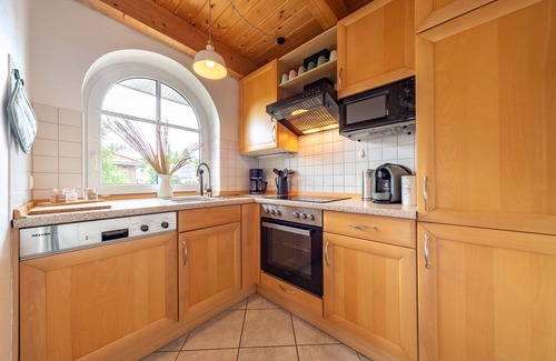 Tannenhausen House | Lüttje Huck - Ferienwohnung 3 mit Seeblick & Sauna
