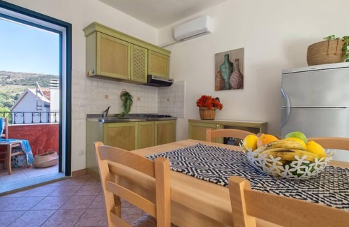 Trinita d'Agultu Apartment | L'Oasi Trilo A6 by Interhome