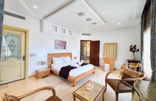 Les Berges Du Lac II House | L'Orchidée - Suites de Luxe avec Piscine Chauffée et Vue sur le Lac de Tunis