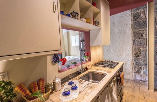 Loro Ciuffenna Apartment | La Badia, a loft studio apartment, surrounded by greenery