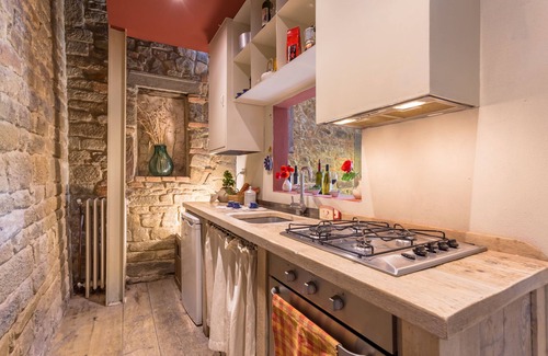 Loro Ciuffenna Apartment | La Badia, a loft studio apartment, surrounded by greenery