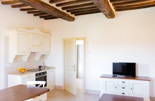 Marsciano Apartment | La Fiaccola, elegant suite with fireplace