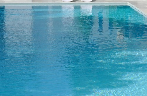San Antonio Bay Villa | La Moreneta 1964 villa with large pool