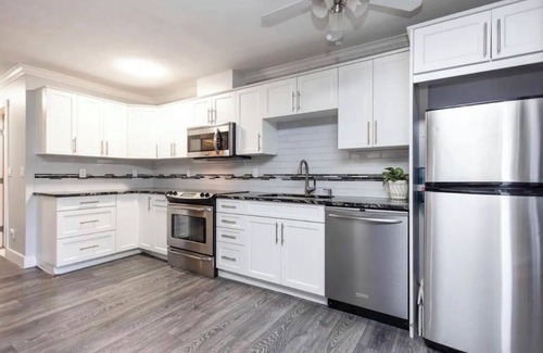 Central Okanagan Condo | Lake condo seconds from the beach. Enjoy the view from the balcony or dockside.
