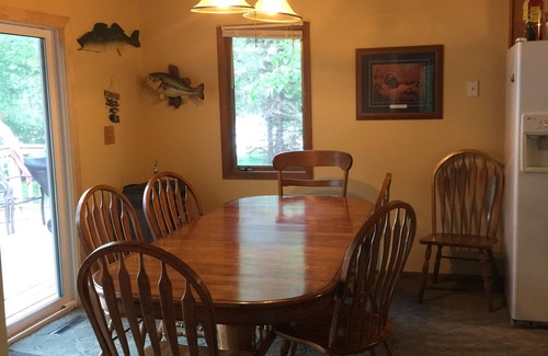 Audubon Cabin | Lake Front Big Yard Fishing Dock Paddle Boat AC Campfire Swimming Grill Deck