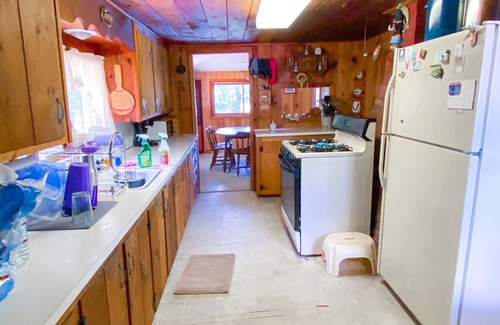 Windham Cottage | Lake Front Cottage with Private Sandy Beach & Beautiful Sunsets
