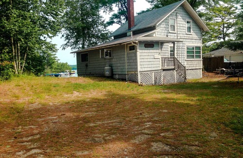 Windham Cottage | Lake Front Cottage with Private Sandy Beach & Beautiful Sunsets
