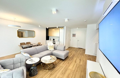 Trzebiatow Apartment | Lake pool view with private beach access Garage
