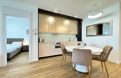 Trzebiatow Apartment | Lake pool view with private beach access Garage