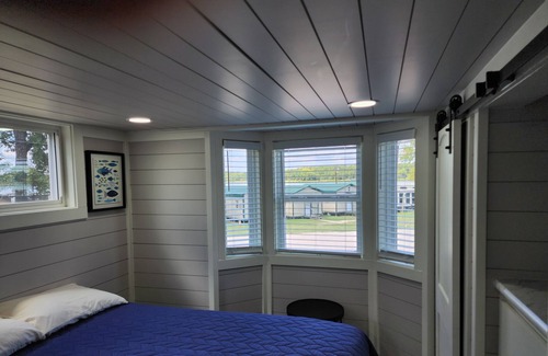 Berryville Cabin | Lake Side Tiny Home, large deck.