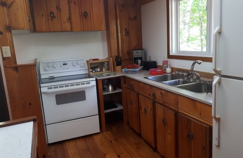 Val-des-Monts Cottage | Lake view Cottage. Private location only a few steps to water access