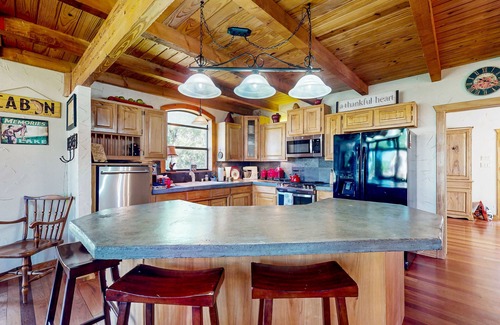 Lake Whitney House | Lake view home with expansive yard, lovely porch & nearby lake access
