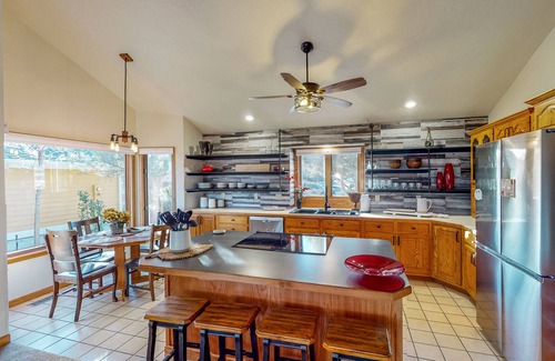Greeley House | Lake-view home with gas fireplaces, inviting deck & dog-friendly yard