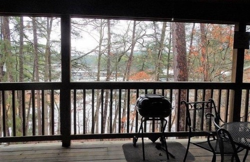 Mount Ida Cottage | Lake view three bedroom, three bath cottage with private hot tub overlooking Lake Ouachita. by RedAwning