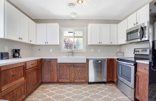 Russells Point House | Lake Views: 2nd-Story Guest Suite with Private Entrances/Yard/Parking