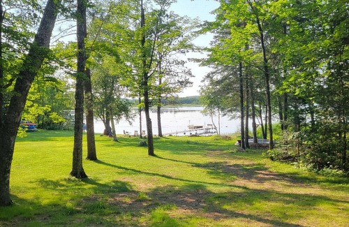 Hayward Cabin | Lakefront 2Bed 1Bath with enclosed screen porch. Westerly view GORGEOUS Sunsets!