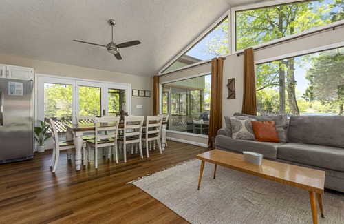 Wolf Creek House | Lakefront Boho Chic 4BR | Playground & Waterslide