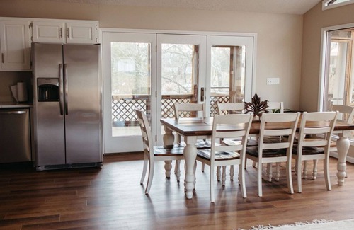 Wolf Creek House | Lakefront Boho Chic 4BR | Playground & Waterslide
