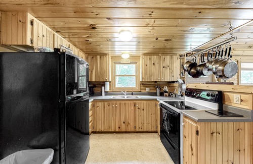 Greenville Cabin | Lakefront cabin on First Roach Pond with dock, lake view & firepit- dog-friendly