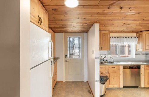 Chestermere Cabin | LAKEFRONT CABIN WITH COVERED DECK, HOT TUB & MORE
