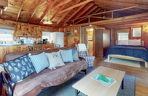 Otis Apartment | Lakefront cabin with deck, grill, screened porch, & firepit - dog-friendly