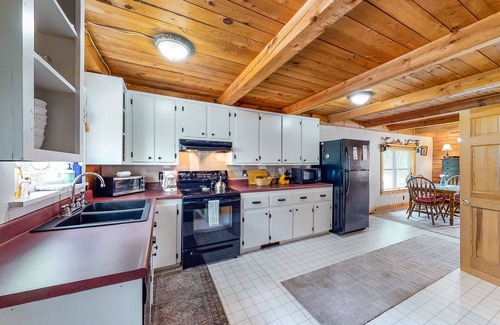 Weeks Mills Cabin | Lakefront cabin with private dock, wood stove, firepit, deck, & grill - 1 dog ok