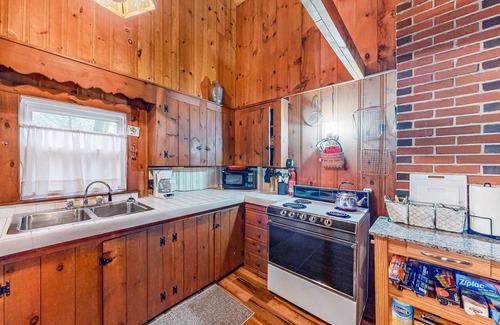 South Casco Cottage | Lakefront camp with cozy cottage-style interior and board games - kayaks welcome