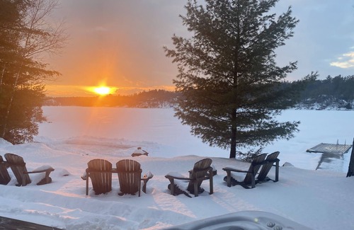 Leeds and the Thousand Islands Cottage | Lakefront, colourful sunsets, hot tub, arcade. Year round fun and relaxation.