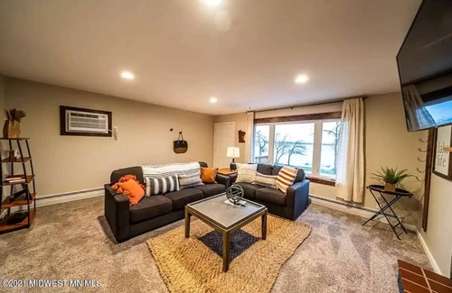 Detroit Lakes Condo | Lakefront Condo, 2 bedroom, with Dock & Private Patio! Walk to Restaurants!