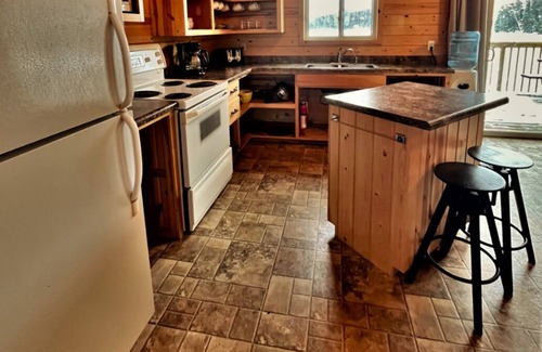 Sioux Narrows Nestor Falls Cottage | Lakefront Cottage with wood fired Hot tub and infrared Sauna