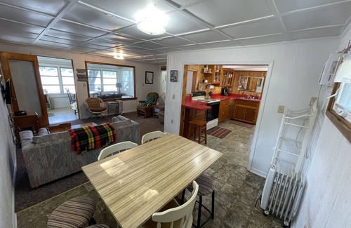 Angola Cottage | Lakefront cottage on first basin of Lake James. Dock, sandy bottom, great sunset