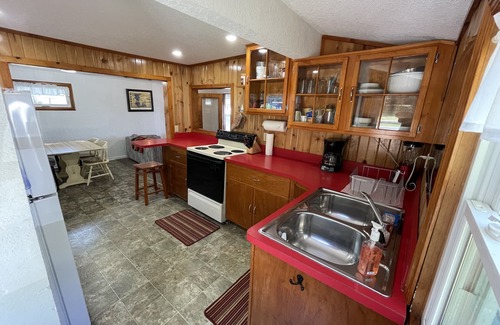 Angola Cottage | Lakefront cottage on first basin of Lake James. Dock, sandy bottom, great sunset