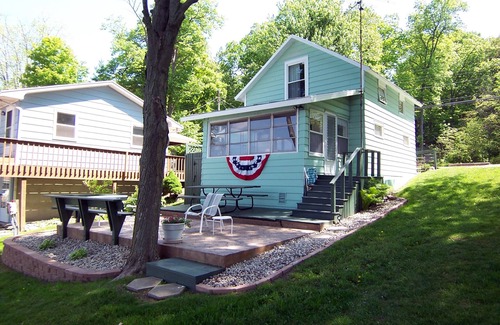 Angola Cottage | Lakefront cottage on first basin of Lake James. Dock, sandy bottom, great sunset
