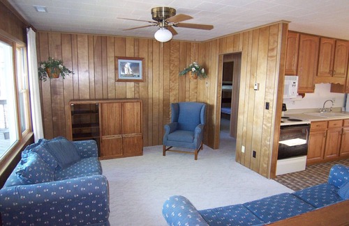 Angola Cottage | Lakefront cottage on first basin of Lake James. Dock, sandy bottom, great sunset