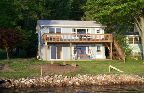 Angola Cottage | Lakefront cottage on first basin of Lake James. Dock, sandy bottom, great sunset