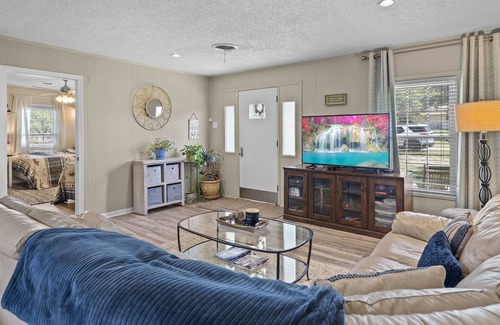Silver Creek Village House | Lakefront Cottage with Private Dock, Wood-Burning Fireplace and Sunroom