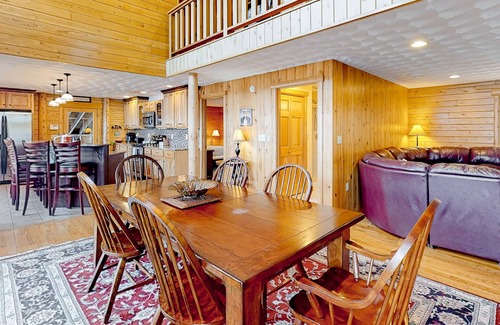 Norway House | Lakefront, dog-friendly home with dock, kayaks, SUPs, canoe, huge deck & firepit