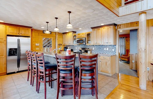 Norway House | Lakefront, dog-friendly home with dock, kayaks, SUPs, canoe, huge deck & firepit